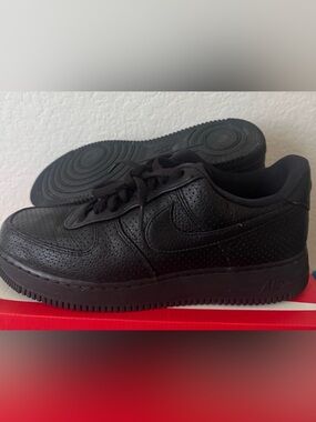 Nike Air Force 1 Black Perforated Leather Low-Top Sneakers